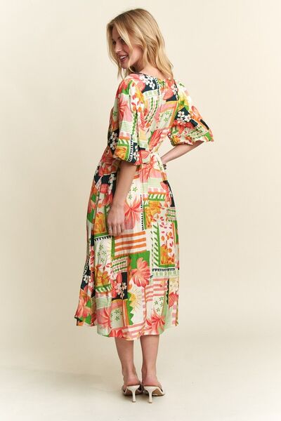 Robe midi ADORA à encolure en V et manches bouffantes à motif floral